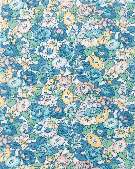 blomstret stof i blå nuancer